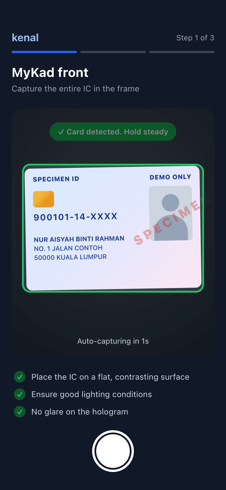 Kenal eKYC phone screen capturing the front of a specimen MyKad, with a green frame, 'Card detected. Hold steady' and capture tips
